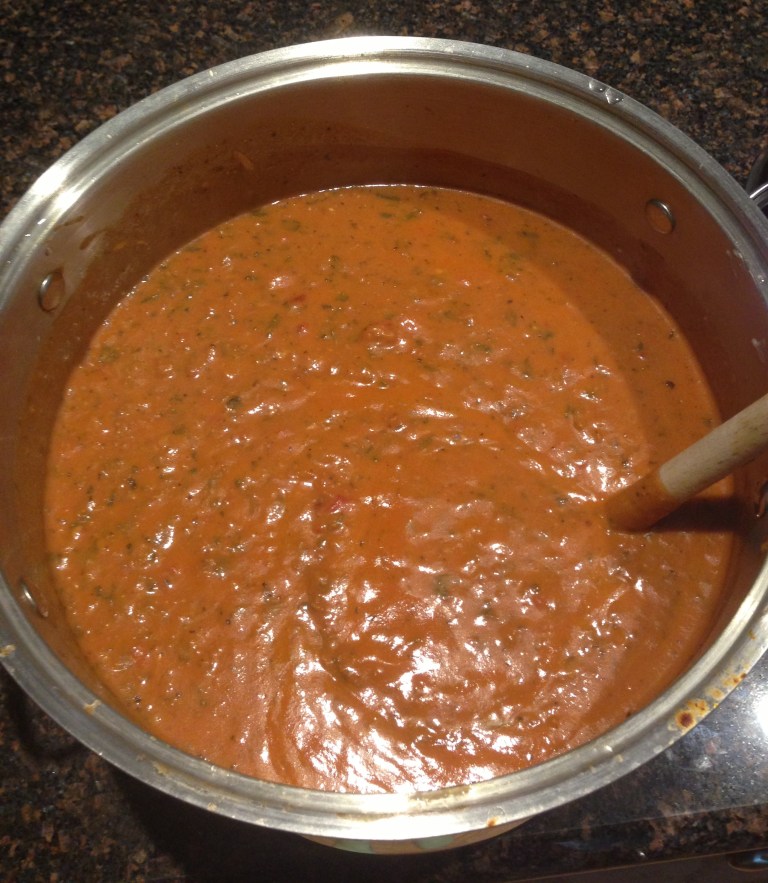 The béchamel combined with tomato sauce