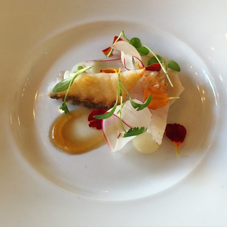 Red snapper with wasabi aioli, ponzu gel, radishes, and marigolds