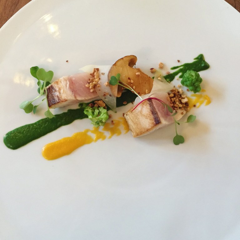 Swordfish with mushrooms, romanesco, spinach purée, papaya and peanuts